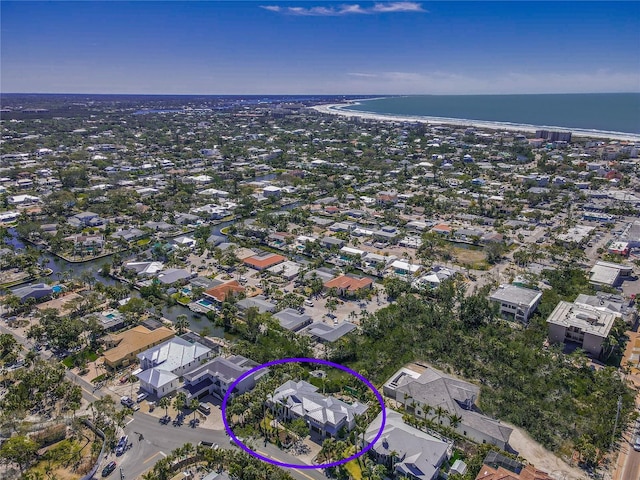 birds eye view of property featuring a residential view and a water view