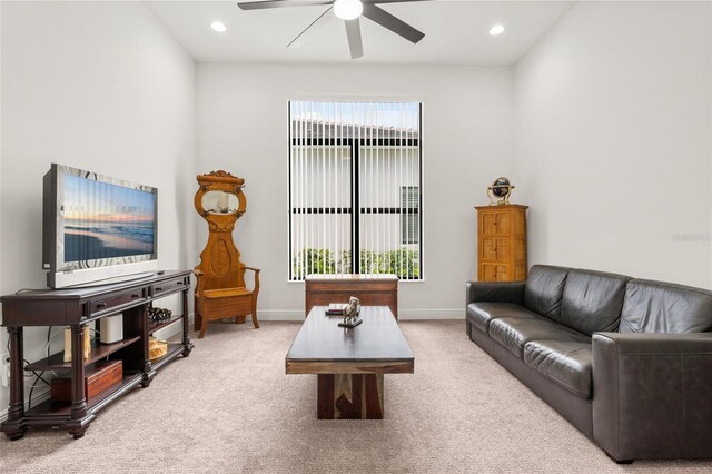living area featuring a ceiling fan, carpet, baseboards, and recessed lighting