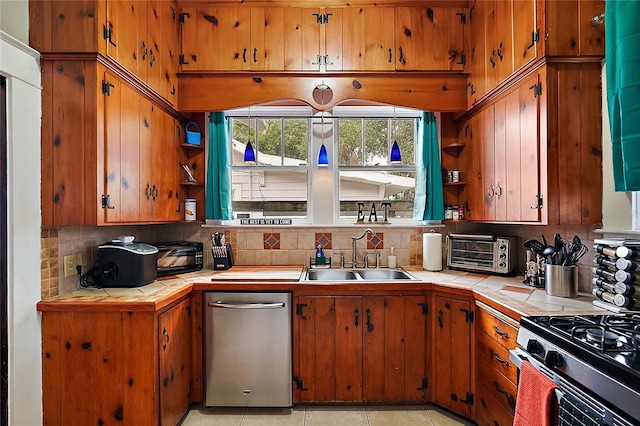 501 Washington Ave, Eustis, FL 32726 - kitchen with tile countertops, tasteful backsplash, a sink, and open shelves