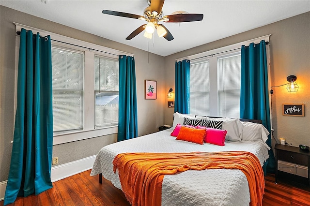 501 Washington Ave, Eustis, FL 32726 - bedroom featuring baseboards, wood finished floors, and a ceiling fan