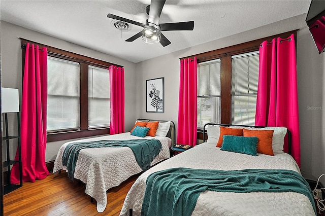 501 Washington Ave, Eustis, FL 32726 - bedroom with ceiling fan and wood finished floors