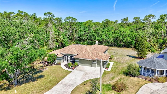 15107 3rd Dr E, Bradenton, FL 34212 - view from above of property with a heavily wooded area