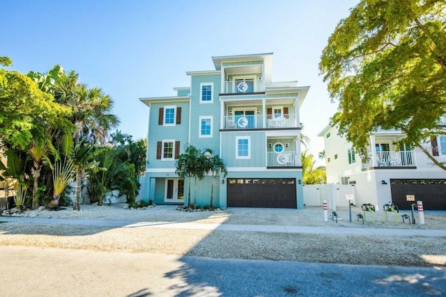 336 Avenida De Mayo, Sarasota, FL 34242 - coastal inspired home featuring driveway, an attached garage, and french doors
