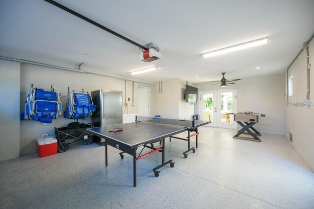 336 Avenida De Mayo, Sarasota, FL 34242 - playroom featuring ceiling fan, speckled floor, and french doors