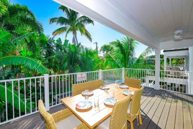 336 Avenida De Mayo, Sarasota, FL 34242 - wooden deck featuring a ceiling fan and outdoor dining space
