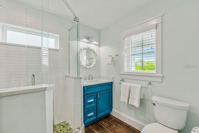 336 Avenida De Mayo, Sarasota, FL 34242 - bathroom with a shower stall, wood tiled floor, and a healthy amount of sunlight