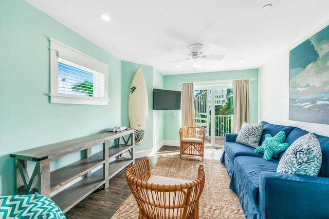 336 Avenida De Mayo, Sarasota, FL 34242 - living room with a ceiling fan, wood finished floors, baseboards, and a wealth of natural light