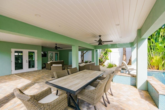 336 Avenida De Mayo, Sarasota, FL 34242 - view of patio / terrace with an outdoor pool, french doors, an outdoor living space, outdoor dining area, and a ceiling fan
