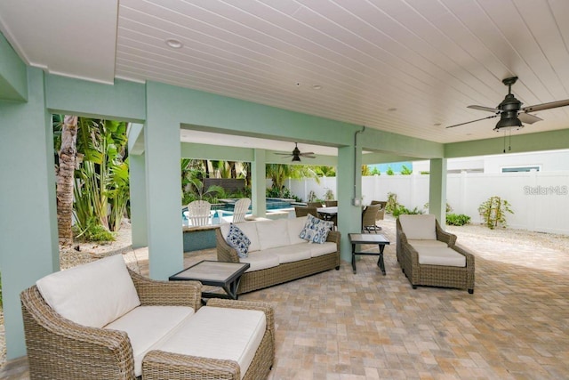336 Avenida De Mayo, Sarasota, FL 34242 - view of patio with a fenced backyard, an outdoor hangout area, ceiling fan, and a fenced in pool