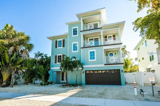 336 Avenida De Mayo, Sarasota, FL 34242 - beach home with gravel driveway, a gate, a garage, and fence