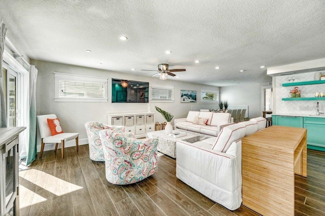 336 Avenida De Mayo, Sarasota, FL 34242 - living room with a ceiling fan, recessed lighting, and dark wood-style flooring