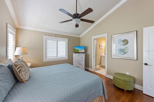 bedroom featuring ornamental molding, multiple windows, wood finished floors, and lofted ceiling
