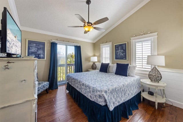 bedroom featuring a textured ceiling, access to exterior, dark wood-style floors, and vaulted ceiling