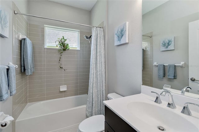 bathroom with toilet, shower / bath combination with curtain, and vanity