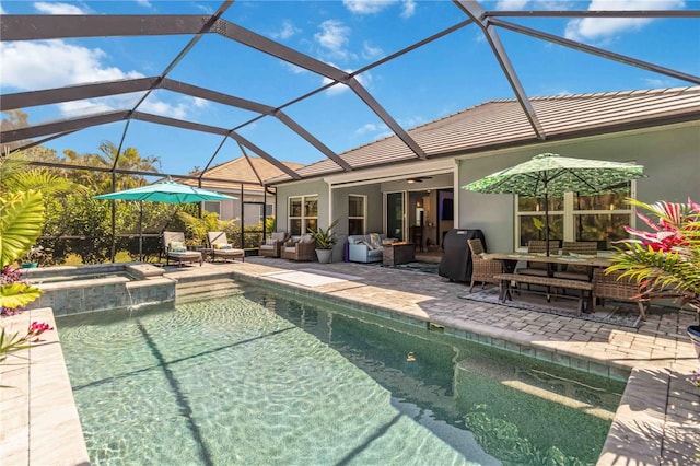 view of pool with an outdoor living space, a patio area, ceiling fan, and a pool with connected hot tub