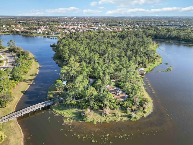 aerial view of property's location featuring a nearby body of water