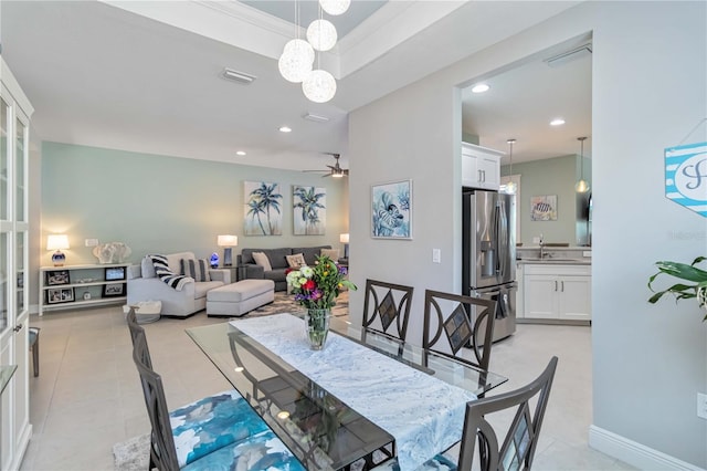 dining room with a chandelier, recessed lighting, light tile patterned floors, and a ceiling fan