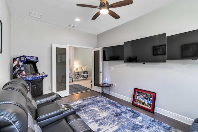 living area with ceiling fan, wood finished floors, baseboards, and recessed lighting