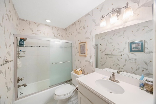 full bathroom featuring toilet, wallpapered walls, vanity, and enclosed tub / shower combo