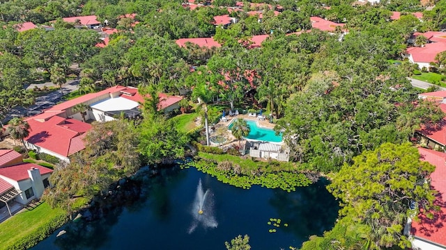 bird's eye view with a water view and a residential view