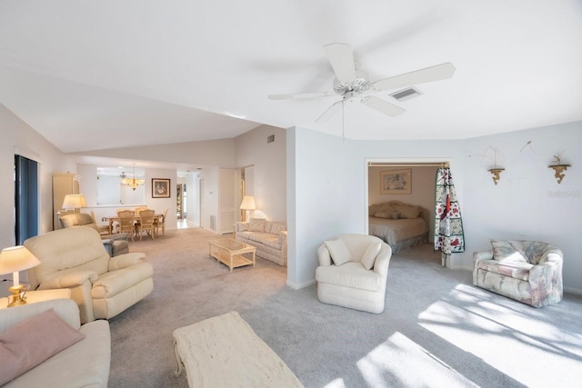 living area with visible vents, baseboards, carpet flooring, and ceiling fan with notable chandelier
