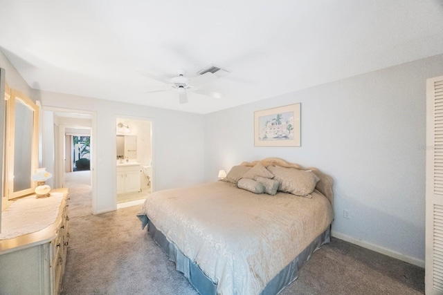bedroom featuring baseboards, connected bathroom, visible vents, ceiling fan, and light colored carpet