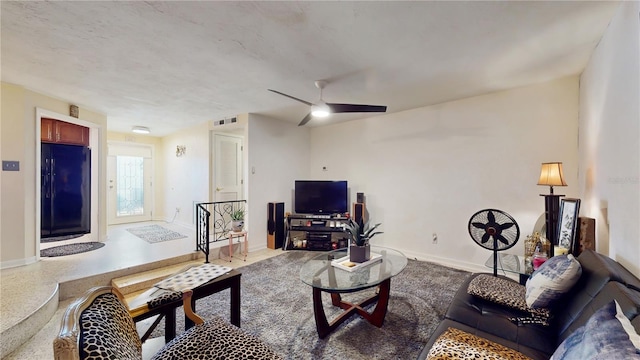 5727 25th St W, Bradenton, FL 34207 - living area with visible vents, baseboards, and ceiling fan