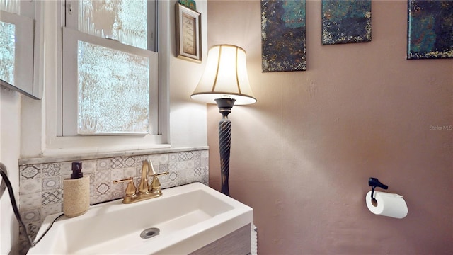 5727 25th St W, Bradenton, FL 34207 - bathroom featuring a sink and plenty of natural light