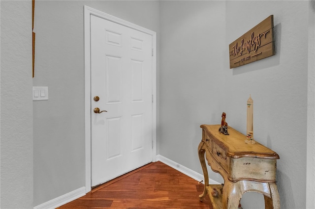 2064 Batello Dr, Venice, FL 34292 - foyer featuring baseboards and wood finished floors