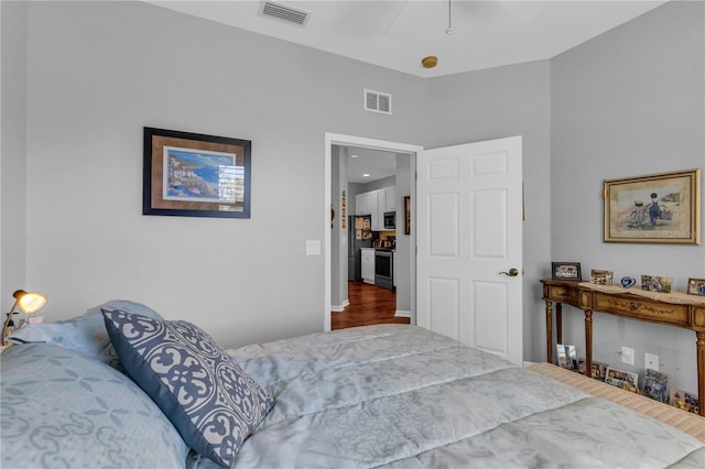 2064 Batello Dr, Venice, FL 34292 - bedroom featuring wood finished floors