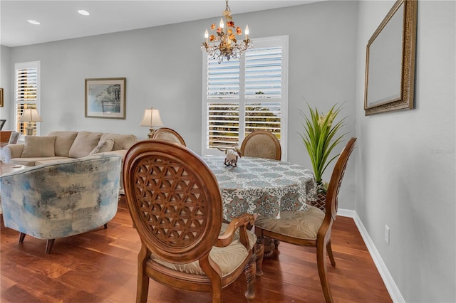 2064 Batello Dr, Venice, FL 34292 - dining area featuring a chandelier, wood finished floors, plenty of natural light, and recessed lighting