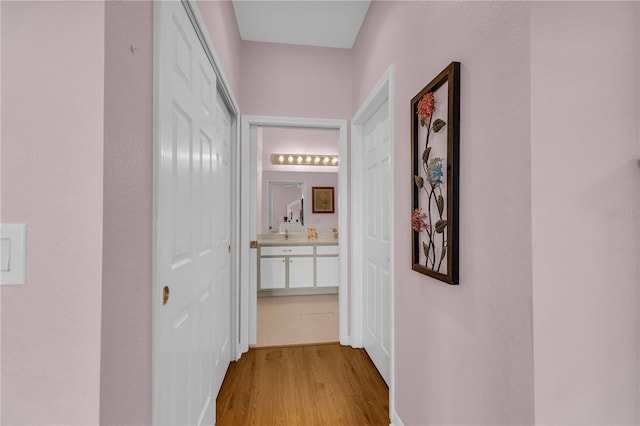2064 Batello Dr, Venice, FL 34292 - hall featuring wood finished floors