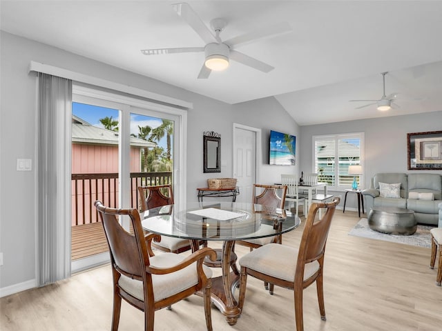 21687/689 Indian Bayou Dr, Fort Myers Beach, FL 33931 - dining area with baseboards, lofted ceiling, ceiling fan, and light wood-type flooring