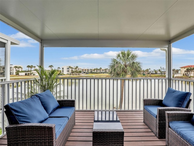 21687/689 Indian Bayou Dr, Fort Myers Beach, FL 33931 - wooden deck with an outdoor hangout area and a water view