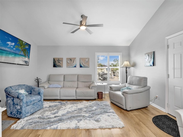 21687/689 Indian Bayou Dr, Fort Myers Beach, FL 33931 - living area featuring a ceiling fan, baseboards, lofted ceiling, and wood finished floors