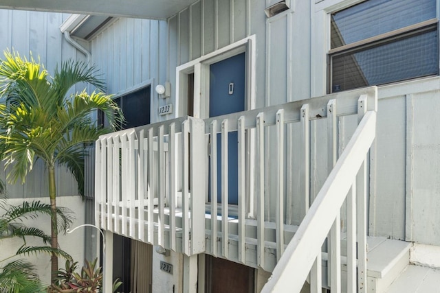 1233 Dockside Pl Unit 207, Sarasota, FL 34242 - view of exterior entry featuring board and batten siding