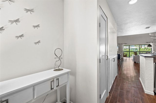1233 Dockside Pl Unit 207, Sarasota, FL 34242 - corridor with dark wood-style flooring