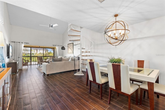 1233 Dockside Pl Unit 207, Sarasota, FL 34242 - dining area featuring high vaulted ceiling, dark wood-type flooring, a chandelier, ceiling fan, and stairs