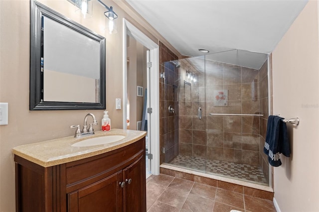 1233 Dockside Pl Unit 207, Sarasota, FL 34242 - bathroom with vanity, a shower stall, and tile patterned flooring