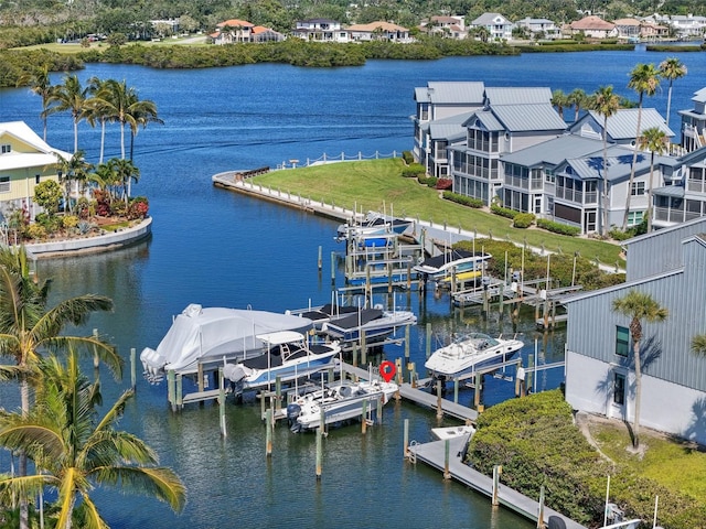 1233 Dockside Pl Unit 207, Sarasota, FL 34242 - dock with boat lift and a water view