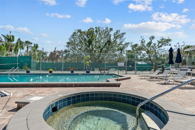 1233 Dockside Pl Unit 207, Sarasota, FL 34242 - community pool with a hot tub and a patio area