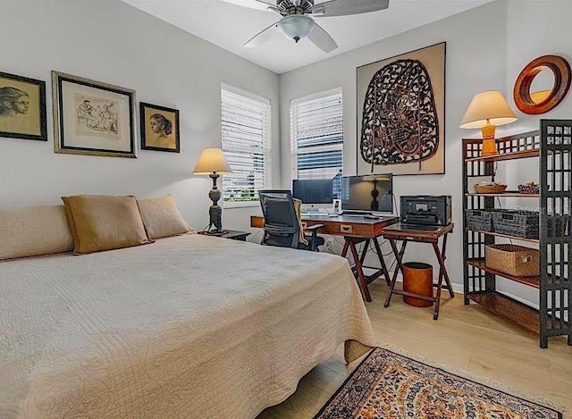 4136 Cascade Falls Dr, Sarasota, FL 34243 - bedroom with wood finished floors and a desk