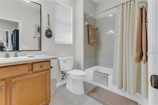 4136 Cascade Falls Dr, Sarasota, FL 34243 - bathroom with toilet, shower / bathtub combination with curtain, vanity, tile patterned flooring, and baseboards