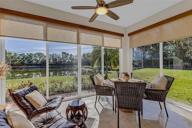 4136 Cascade Falls Dr, Sarasota, FL 34243 - sunroom / solarium with a water view and tile patterned floors