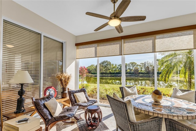 4136 Cascade Falls Dr, Sarasota, FL 34243 - sunroom / solarium with a water view, healthy amount of natural light, and tile patterned floors