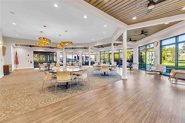 4136 Cascade Falls Dr, Sarasota, FL 34243 - dining room featuring recessed lighting, a ceiling fan, plenty of natural light, baseboards, and light wood-style floors