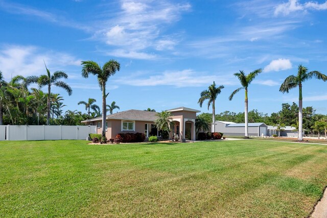 5209 26th Ave W, Bradenton, FL 34209 - rear view of house featuring stucco siding