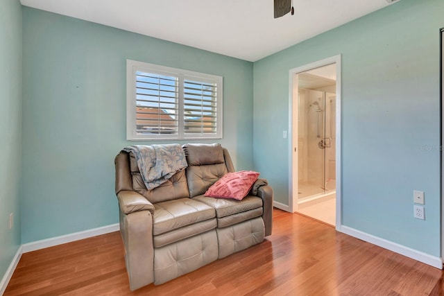 5209 26th Ave W, Bradenton, FL 34209 - living room featuring wood finished floors, a ceiling fan, and baseboards