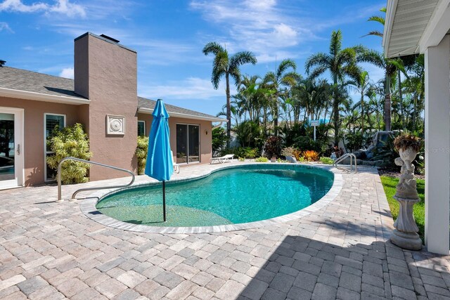 5209 26th Ave W, Bradenton, FL 34209 - outdoor pool featuring a patio area
