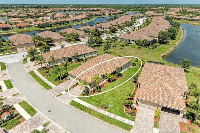 19889 Benissimo Dr, Venice, FL 34293 - drone / aerial view with a water view and a residential view